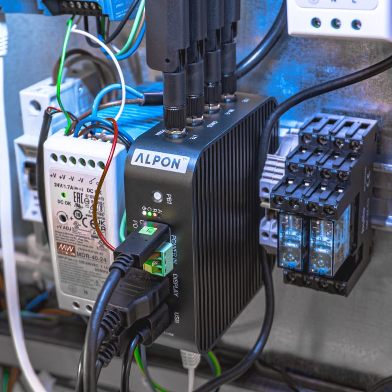 Angled view of the ALPON DIN rail mount adapter showing the rail-side snap-on lock