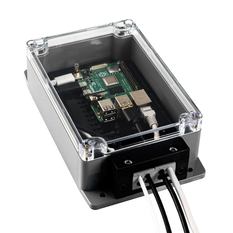 Sixfab IP65 outdoor Raspberry Pi enclosure showing gasket-sealed clear lid and IP-rated cable gland entry points